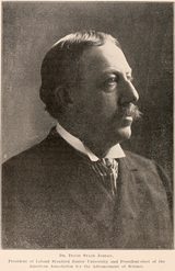 Halftone portrait of David Starr Jordan in right profile, a heavy-set man with a mustache, in a dark suit and patterned tie; the printed caption below calls him President of Leland Stanford Junior University and President-elect of the American Association for the Advancement of Science.